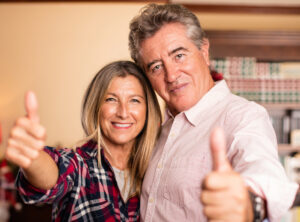 middle aged couple having fun christmas